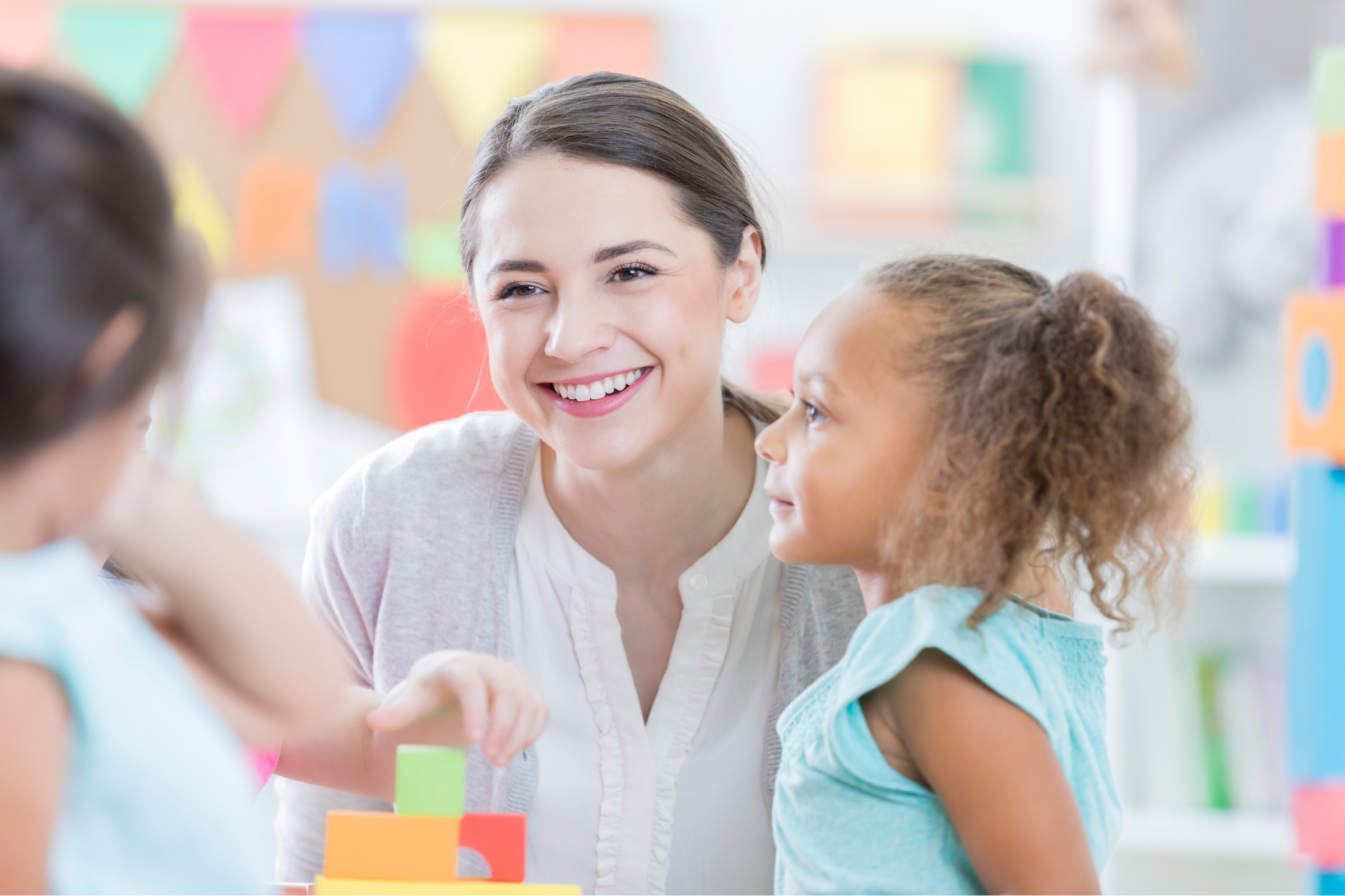 Children's Care Services Support Worker facilitating a learning activity